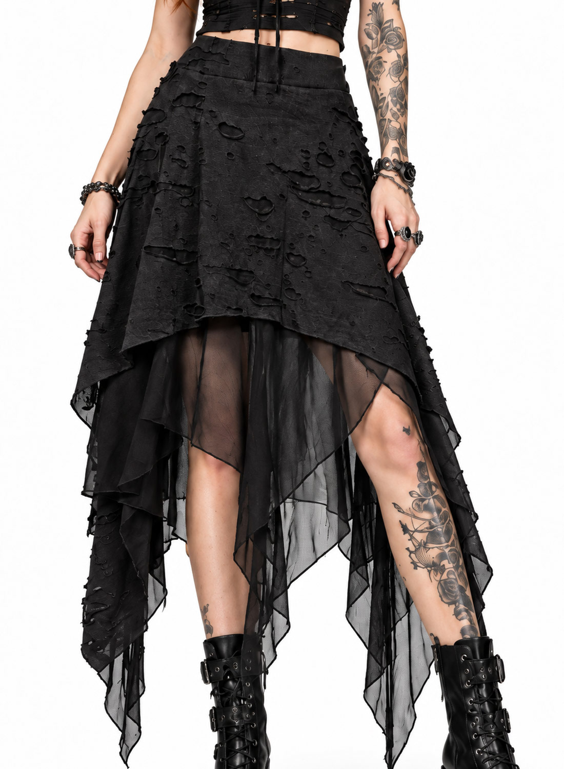 Apocalypse Chic Skirt, sort gotisk asymmetrisk nederdel med struktureret distressed-stof, transparente mesh-lag, spidse kanter og elastisk talje.